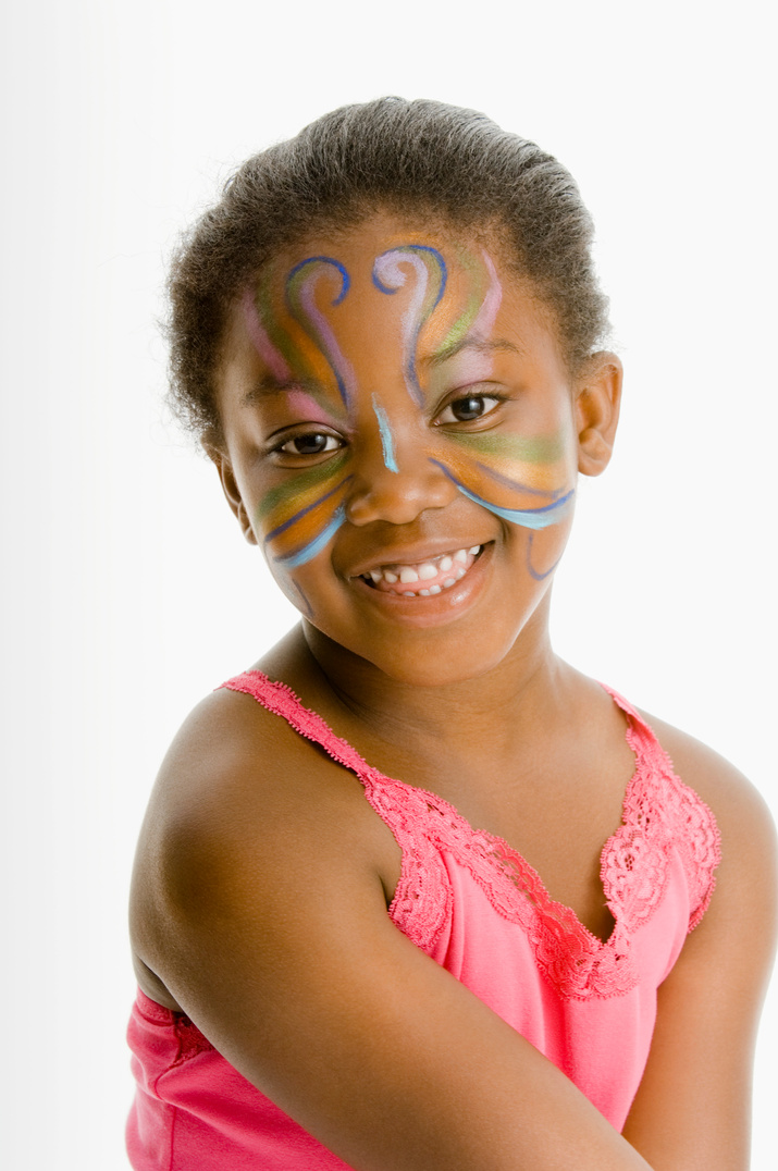 Smiling girl with face paint